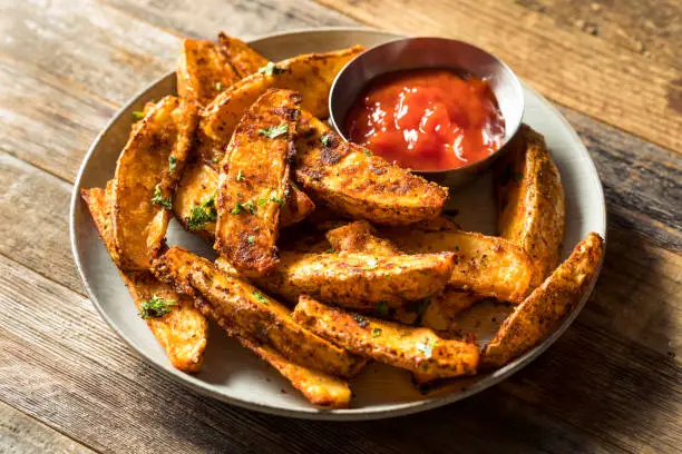 Photo of Homemade Spicy Oven Fried Potato Wedges