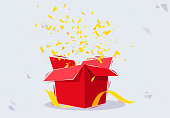 istock vector illustration of a golden confetti flying out of an open red gift box with gold ribbons 1323874508