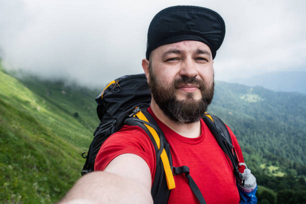 istock Traveler taking selfie in the mountains 1323876493