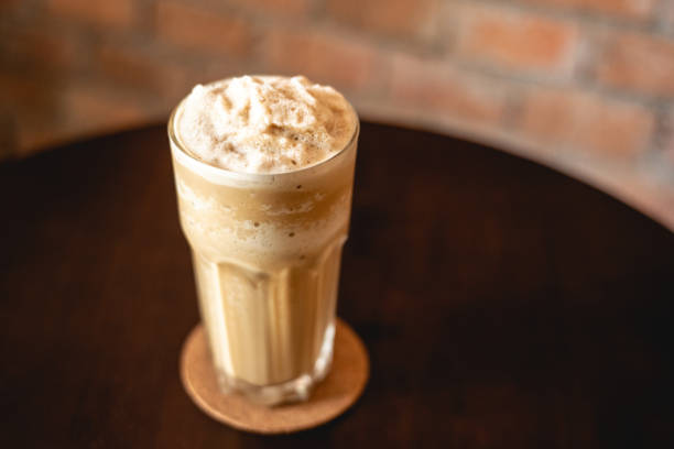 istock Milk tea. Beverage for summer with brick wall background. 1323877518