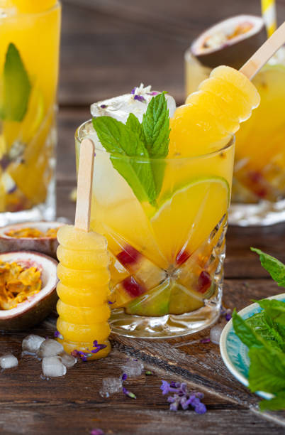 istock Ice cold cocktail with fresh passion fruit 1323882392