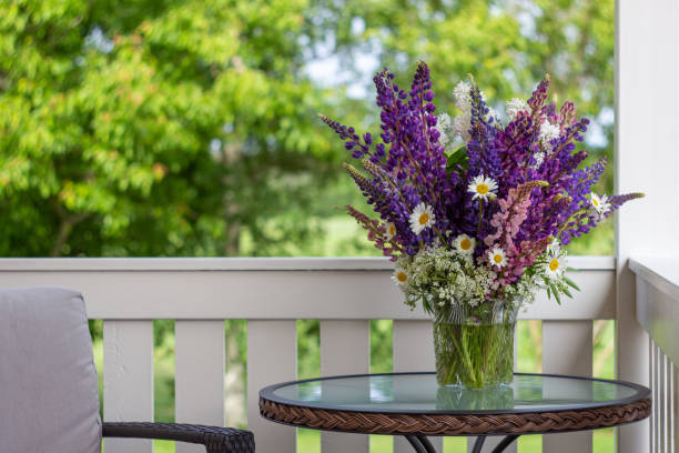 Lupine bouquet on a terrace stock photo