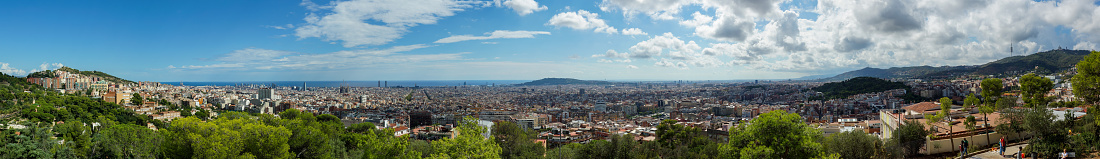 Spain, Barcelona photos taken on 2016 from hills near Guel Park. Wide view of city and hills. Many details.