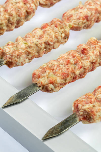 istock Azerbaijan cuisine lula kebab on skewer 1323894432