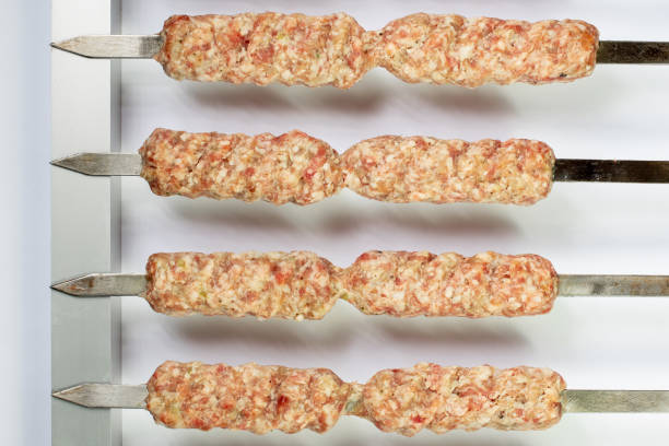 istock Azerbaijan cuisine lula kebab on skewer 1323894475