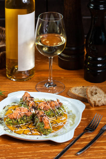 istock Diner in restaurant, salmon and wine 1323894519