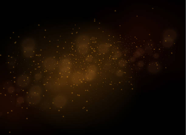 istock Dust sparks, golden stars shine special light. 1323895141