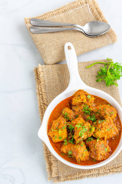 istock Chicken Curry Top Down Photo Vertical Photo 1323896486