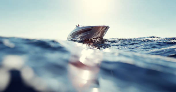 catamarán a motor yate en el océano - pasear en coche sin destino fotografías e imágenes de stock