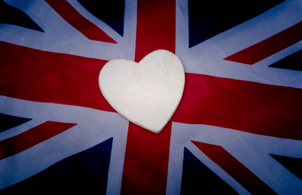 istock White heart shape on UK flag - love for England 1323902336