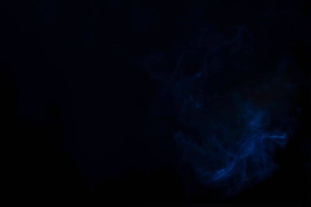 istock Blue and pink steam on a black background. 1323914508