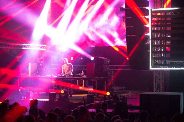 istock Dj playing on the stage in summer 1323915785