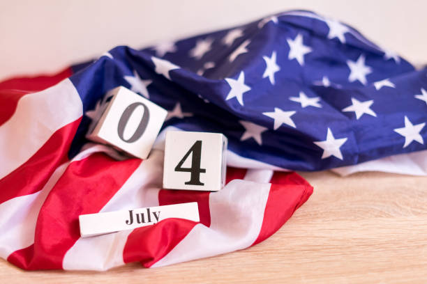 istock Light box with text HAPPY 4 JULY on a dark wooden background. 1323916013