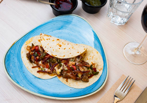 istock Tacos, mexican spicy food with beef 1323918930