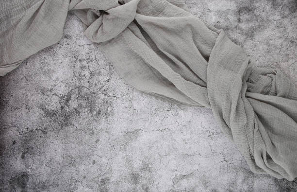 istock Gauze tablecloth on stone background. 1323924999