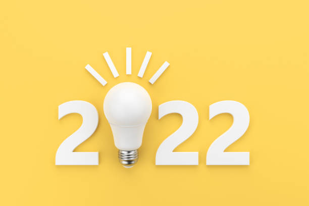 istock 2022 with a white LED lamp on a yellow background. 1323925927