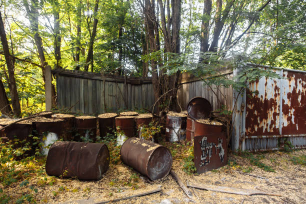 istock Rusty metal barrels in ghost town Pripyat, Chernobyl Exclusion Zone 1323927344