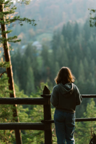 istock Woman walking in mountains 1323927457