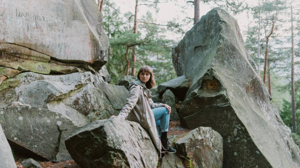 istock Woman walking in mountains 1323927575