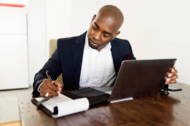 istock Mature African-American man working from home. 1323928685