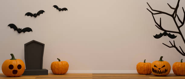 istock Scary stuff with grave, grinning pumpkins, dried tree and bats decorated in the room, 3D rendering 1323968700
