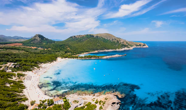 Aerial view of Cala Agulla Aerial view of Cala Agulla and beautiful coast at Cala Ratjada of Mallorca, Spain bay of water stock pictures, royalty-free photos & images