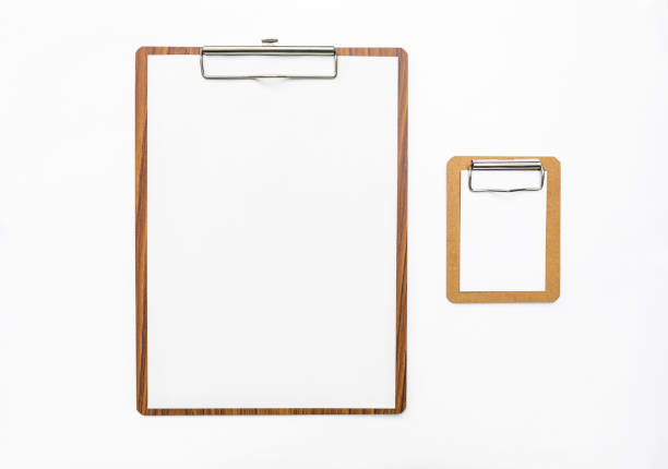 istock Wooden clipboard with blank paper and small paper clipboard isolate on white background 1323976068