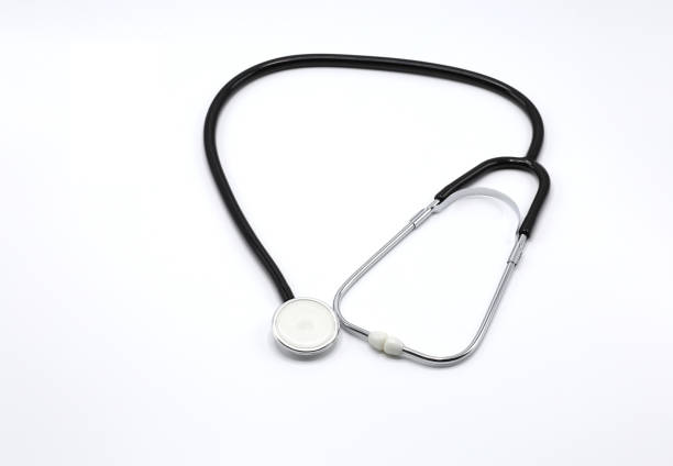 istock Black stethoscope closeup on white background 1323977834
