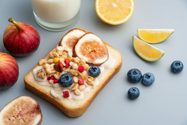 istock Western-style healthy breakfast with figs and cake oatmeal. Western-style nutritious breakfast on the gray tabletopCut, colorful, colorful, red, yellow, 1323977981