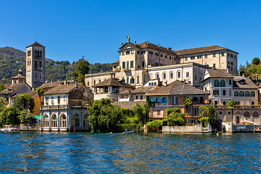 View of old abbey and monastery on San Giulio island on Lake Orta in Piedmont, Northern Italy.
