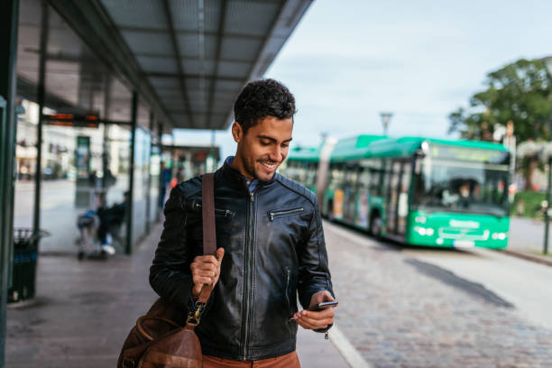 istock Brazilian commuter using public transportation and mobile phone 1323990337