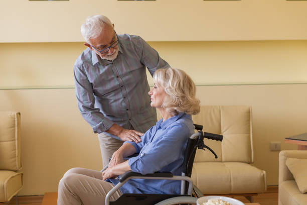 istock Disabled Woman is Enjoying the Time with her Husband While at Home. 1323990368