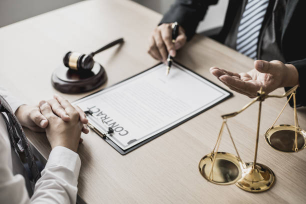 istock Attorneys advising in cases where a client has been defrauded by a defendant who is a business partner forming a joint company, advising on litigation and gathering evidence. Fraud case concept. 1323991843