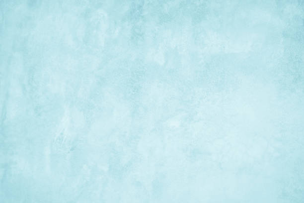 istock Pastel Blue and White concrete stone texture for background in summer wallpaper. Cement and sand wall of tone vintage. Concrete abstract wall of light cyan color, cement texture mint green for design. 1324002523