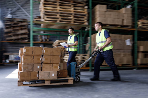 istock Shipping packages in blurred motion! 1324010827