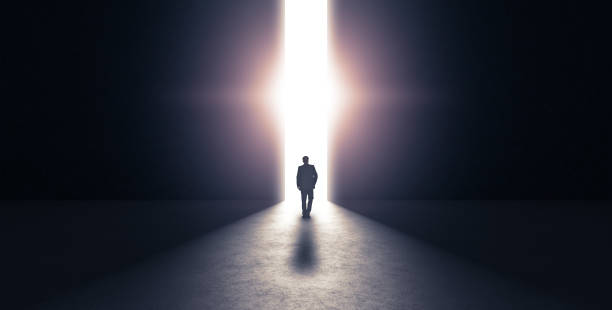 man walking towards light concept. 3d rendering - man silhouette imagens e fotografias de stock