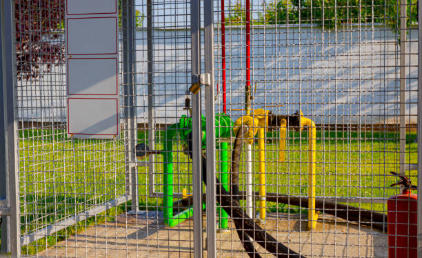 istock Natural gas distribution station with fence 1324011424