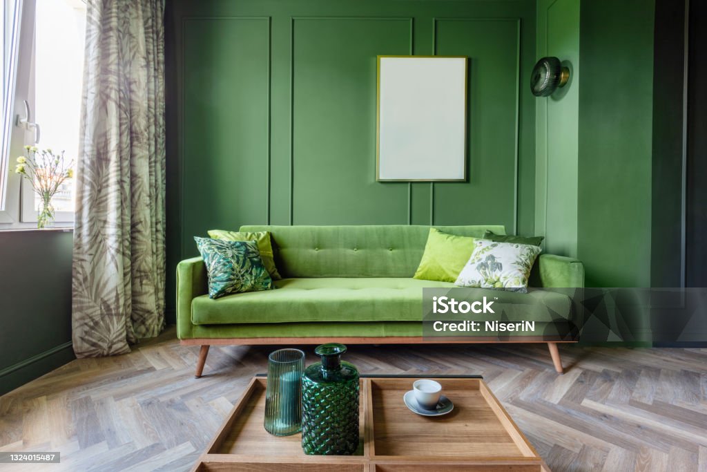 Small elegant apartment interior design Living room in a small elegant apartment. Interior design Green Color Stock Photo