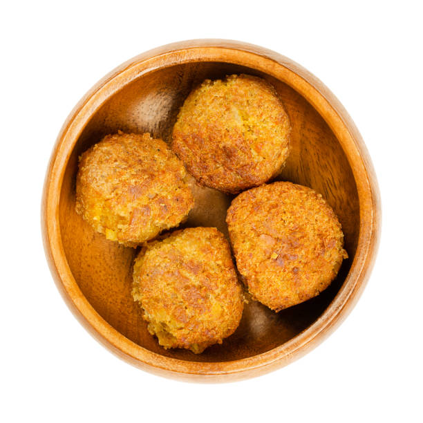 Fried vegan falafel balls, chickpea fritters in wooden bowl