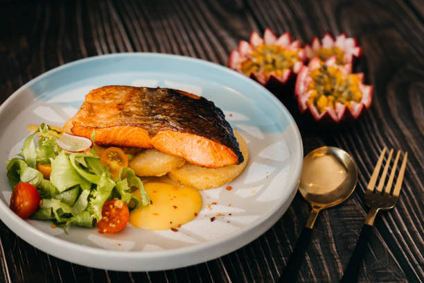 istock Salmon Grilled with passion sauce photography 1324019048