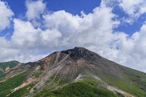 Mount Chausu in the summer.The Nasu Mountain Range refers to the mountains straddling the border between Tochigi Prefecture and Fukushima Prefecture.The mountains are part of Nikko National Park.