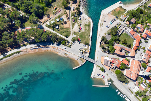 Aerial view of drawbridge in historic town of Osor. The bridge connects the islands of Cres and Losinj