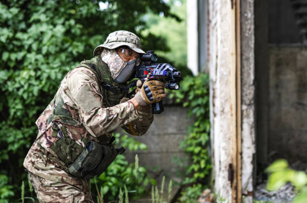 istock Warrior stalking through corridor in abandoned building 1324020968