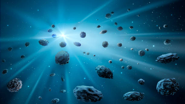 istock Space background. Asteroid field in blue nebula with light streak. 3D rendering 1324023908