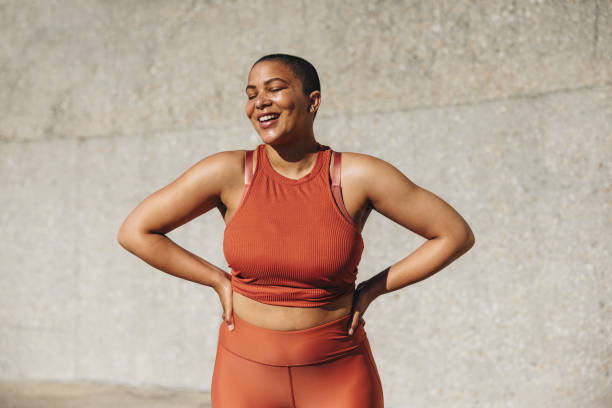 istock Plus size woman relaxing after workout 1324026986