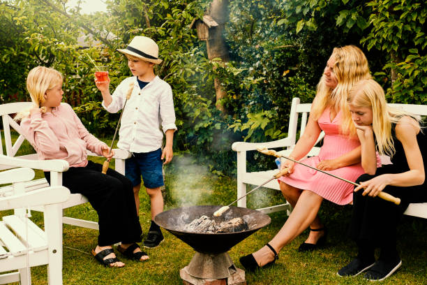 istock Mother and three children 1324027618