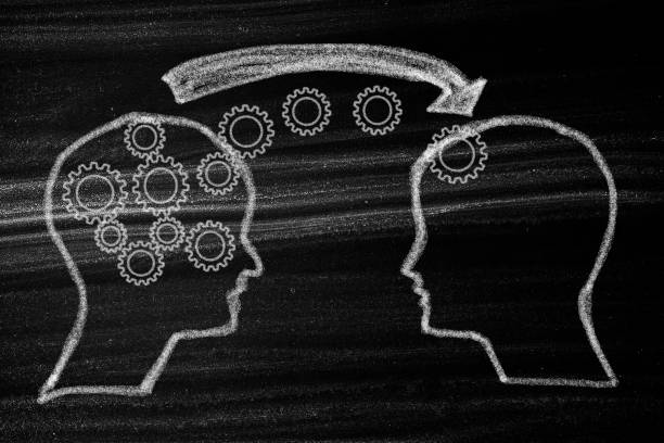 istock Head silhouette and tooth wheels with knowledge transfer and education concept 1324028402