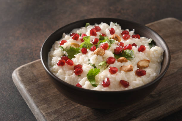 istock Curd Rice with pomegranate, cilantro, mustard seeds, ginger. Indian cuisine 1324029486