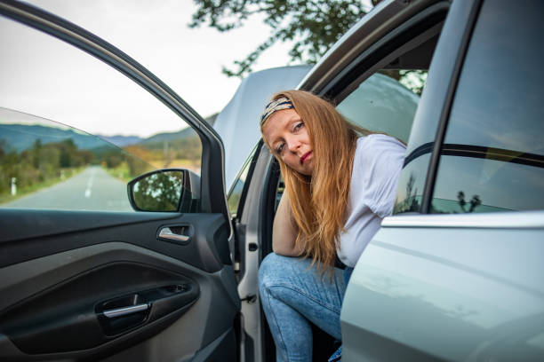 istock Girl having car trouble. 1324032290