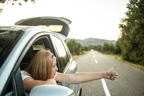 istock Girl having car trouble. 1324033052